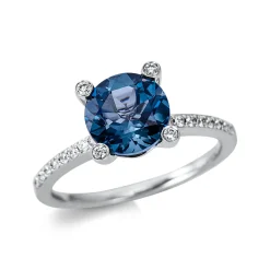 Ring aus 750 Weißgold Topas 2,19ct London Blue 36 Diamanten 0,22ct TW-SI Ø8,4mm
